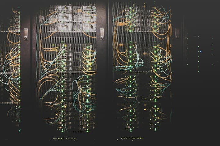 Server rack with neatly patched network cables powering automated workflows
